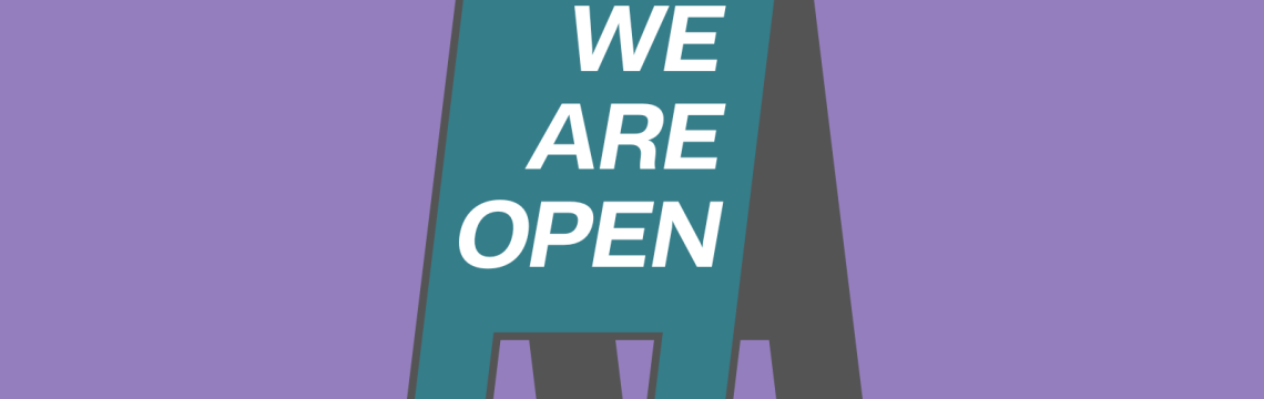 Placard with 'we are open'
